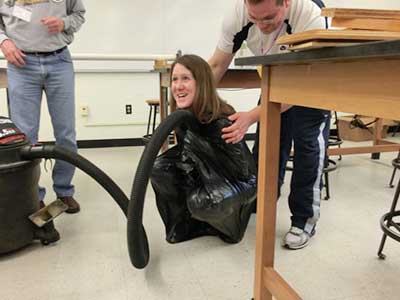 Jennifer Docktor gets "vacuum sealed" at University of Wisconsin - La Crosse photo