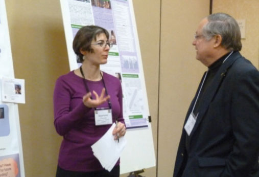 Jack Hehn of AIP and Stephanie Chasteen, CU Boulder, in conversation at the PhysTEC poster session.