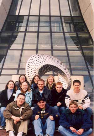 The author's students in front of a Robert Wilson Sculpture, Wilson Hall, Fermilab, 2003.