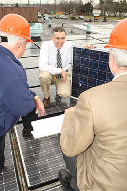 Fig 1. Representative Rush Holt visiting a solar panel manufacturing facility in New Jersey